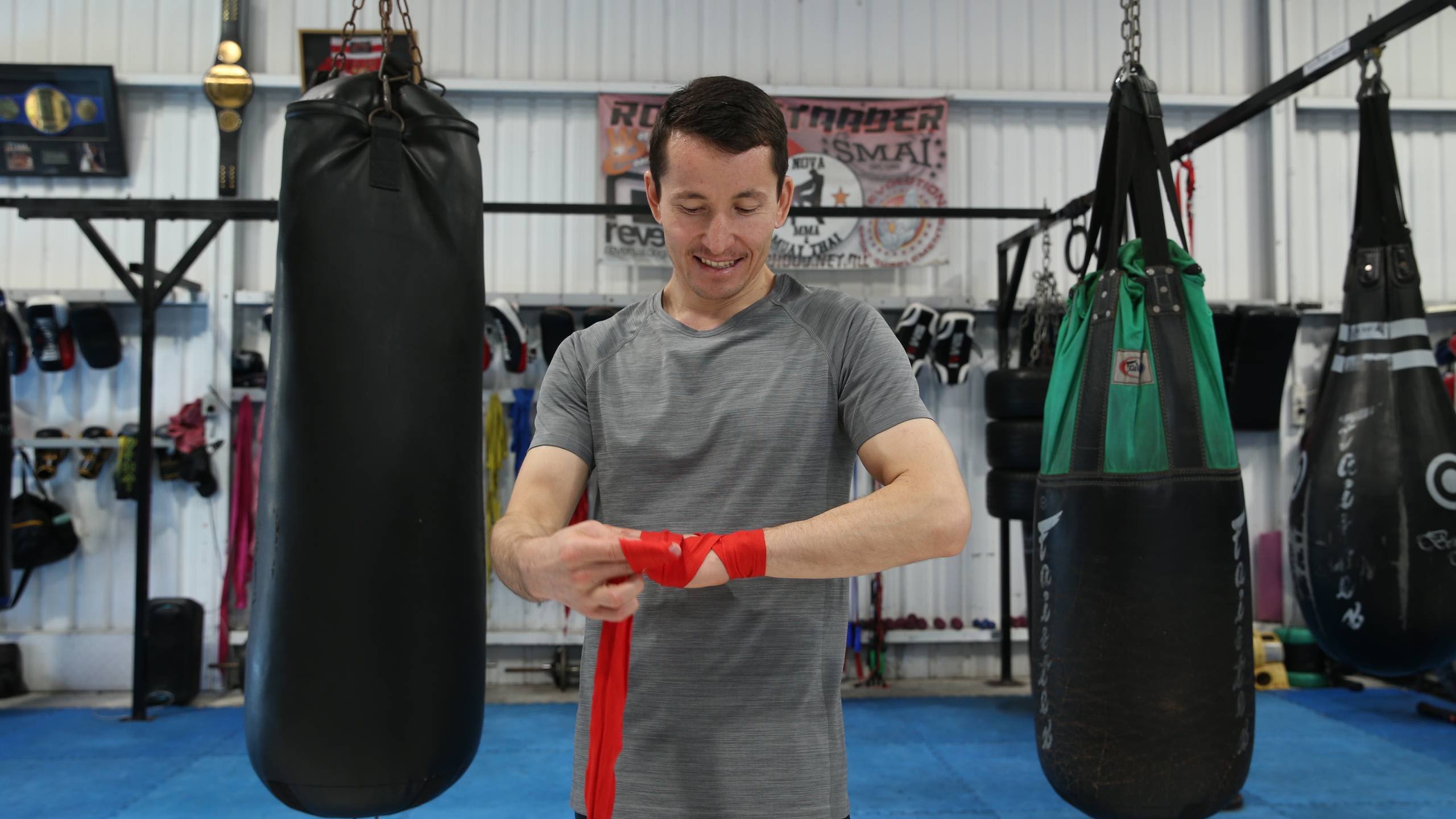 Asif Sultani wraps his hands.